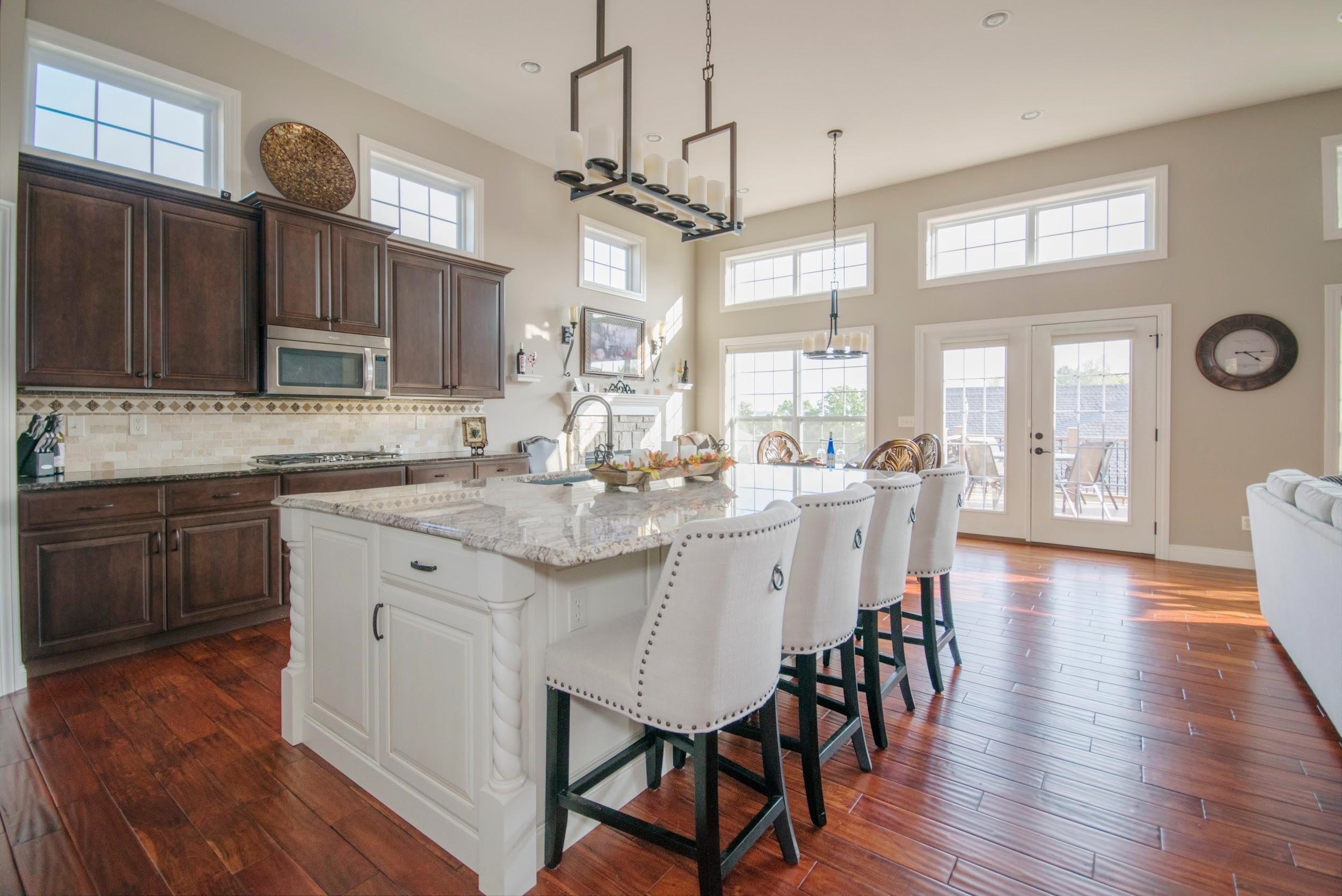 Clean Kitchen With an Island in the Middle