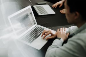 Director of Operations working on a laptop