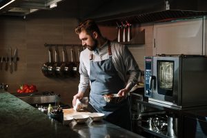 private chef in the kitchen creating food for people