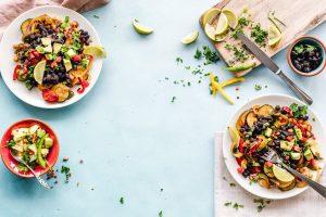 a bunch of bowls with food created by a private chef