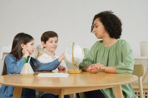 lady homeschooling a couple of kids