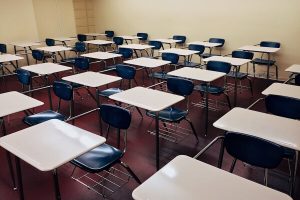 A classroom full of desks in a trade school
