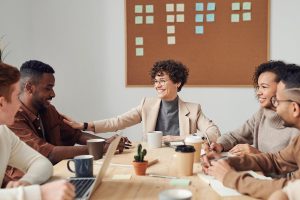 A group of people having a meeting in an office